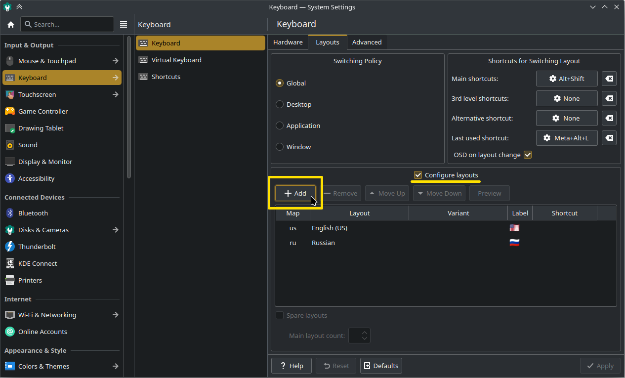 KDE Plasma keyboard settings page with only two layouts: English (US) and Russian